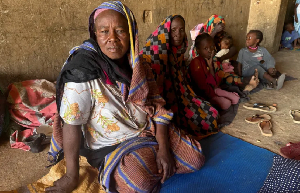 Displaced women from South Kordofan sit on the ground in El Obeid, North Kordofan state, Sudan