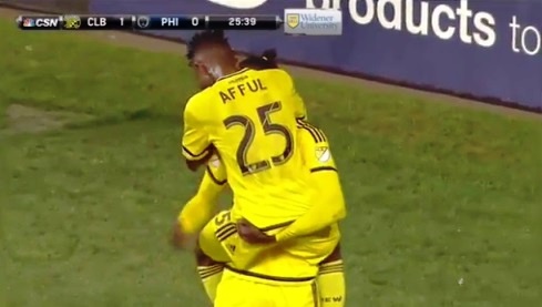 Harrison Afful celebrates Kei Kamara