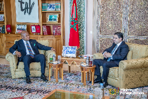 Samuel Okudzeto (L) in a meeting with Morocco’s Foreign Minister, Nasser Bourita