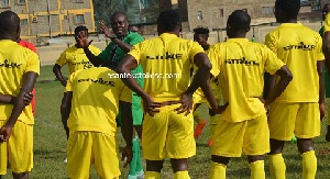 Asante Kotoko Players with Coach CK Akunnor