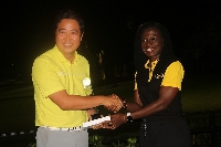 Kojo Choi receiving the award