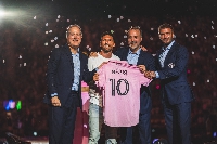 Lionel Messi (second from left) with officials of Inter Miami at the unveiling