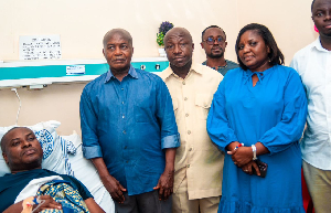 Richard Ahiagbah [L], Stephen Ntim and others during the visit