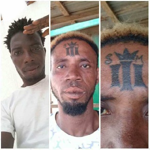 A fan of Shatta Wale with the tattoo on his forehead