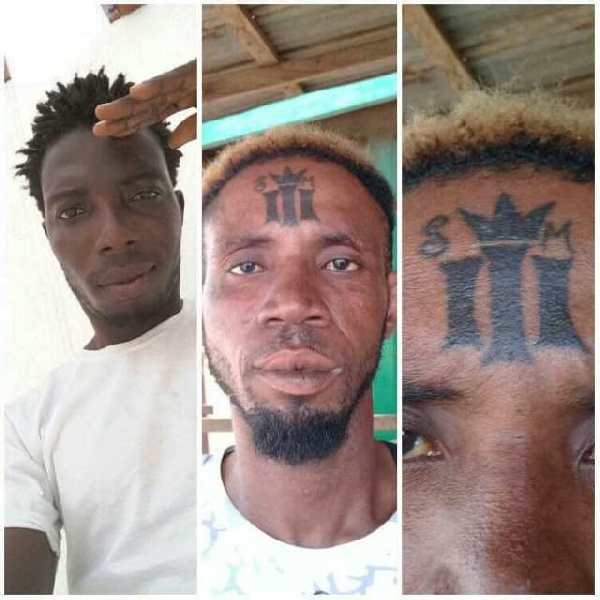 A fan of Shatta Wale with the tattoo on his forehead