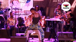 Wiyaala gives Okyeame Kwame a lap dance