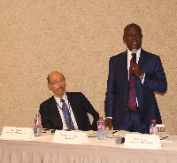 Deputy Managing Director of the Bank in charge of Operations, Mr Samuel Amankwah (R)