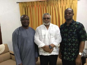 Chief Sam-Sumana (left) poses with former President Rawlings