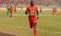 Amos Frimpong celebrates his winning goal for Kotoko