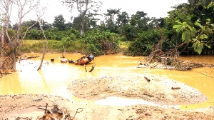 The discolored Pra River affected by galamsey.