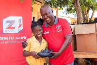 A Zenith Bank official with a beneficiary