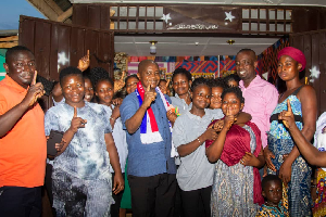 Stephen Ntim (middle in blue attire) with Dormaa East constituents