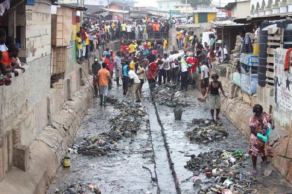 People cleaning their vicinity