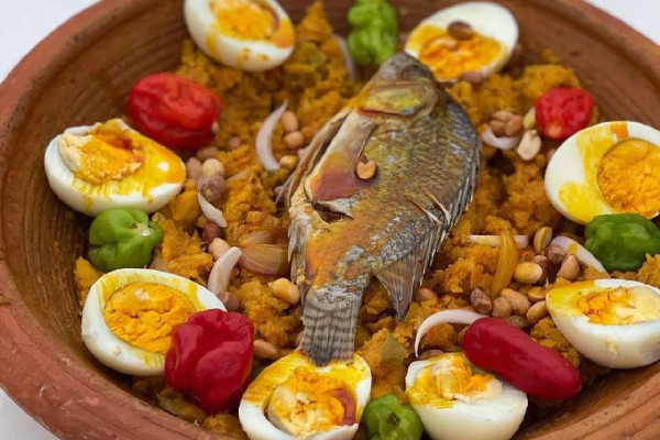 Etor is a nutritious Ghanaian dish made with plantain, yam, palm oil, and eggs