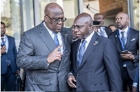 Congo President Felix Tshisekedi (L) talks with Angola’s foreign minister Tete Antonio (R)