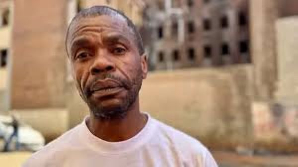 Vusi Tshabalala escaped a fire by running out covered in a wet blanket