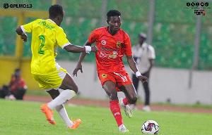 Asante Kotoko's Enoch Morrison up against Chelsea's Ameyaw