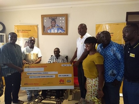 MTN presented a cheque of thousands of cedis and hamper toward the annual festive activities
