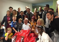 Christian Atsu with some of the patients at the hospital