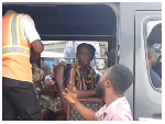 Watch as task force officer tackles ‘trotro mate’ for dumping refuse by the roadside
