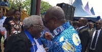 President Mahama hugging Moderator of the Presby Church of Ghana Prof Martey