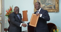 Akufo-Addo and Alassane Ouattara in a photograph after signing the pact