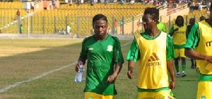 Elvis Opoku (right) with a teammate