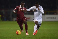 Afriyie Acquah (L) of Torino FC competes with Godfred Donsah of Bologna FC