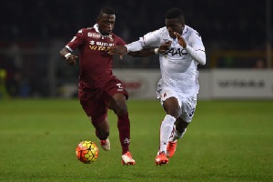 Afriyie Acquah (L) of Torino FC competes with Godfred Donsah of Bologna FC