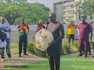 President of the GFA, Kurt Okraku laying a wreath