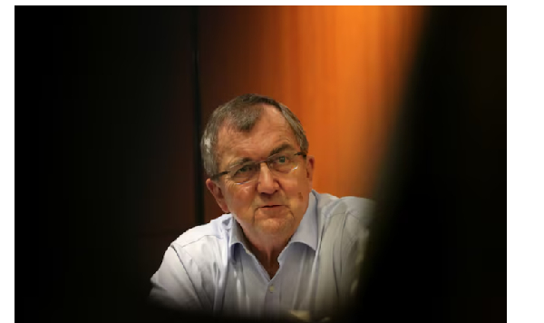 Mark Bristow, CEO of Barrick Gold ​Co. looks on during an interview with Reuters