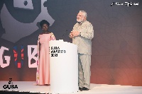JJ Rawlings delivering the keynote address at the 2018 GUBA Awards in London