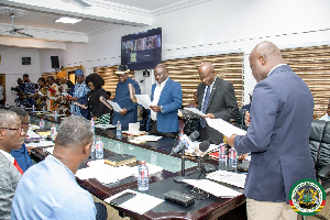 Members of the board being sworn in