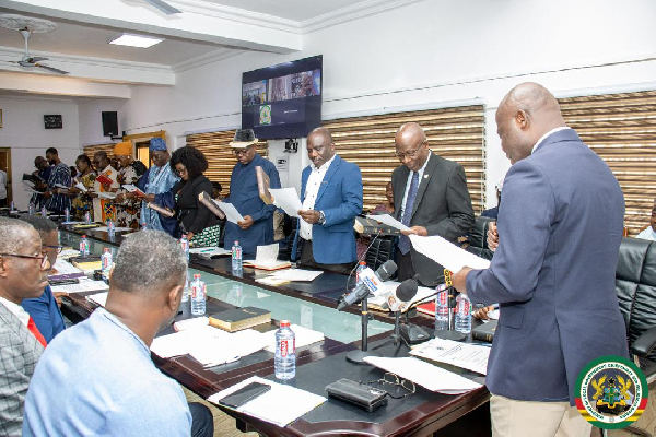 Members of the board being sworn in