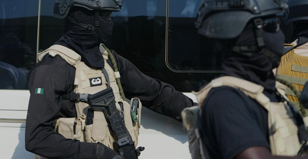 Members of the Nigerian army provide security during an event in Minna