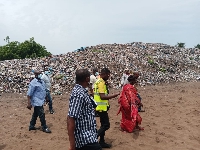 The MP with the officials at the Dekeme rubbish site