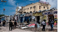 Debris litters the street after a deadly 30-hour siege by Al-Shabaab