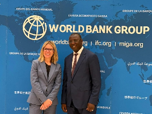 Minster of Finance, Dr. Mohammed Amin Adam with a World Bank official after the meeting