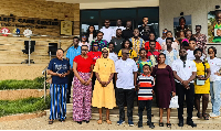 Participants of the workshop pose for a photo