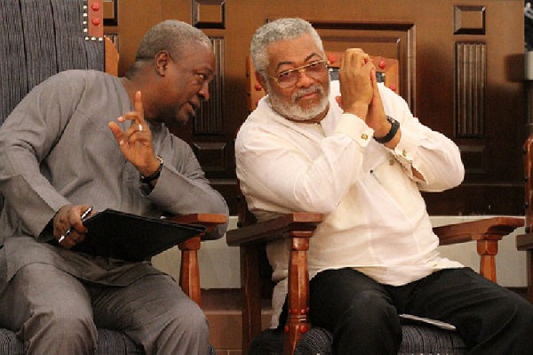 President John Mahama in a chat with former President Rawlings