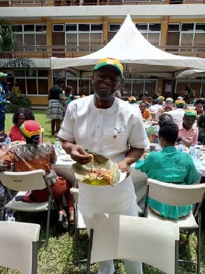 Ken Ofori-Atta eating his waakye at the 'Kenkey Party'