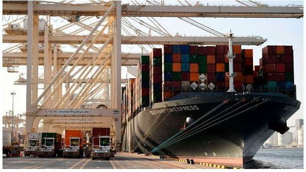 A  container ship is docked at the port of Jebel Ali
