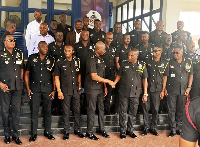 The promoted officers with members of Police Management Board
