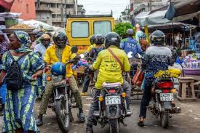 A motorcycle taxi at a market in Cotonou, Benin