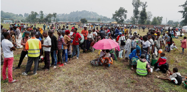 Civilians who fled Goma in eastern DRC gather at a reception centre in Rugerero, Rubavu District, Rw
