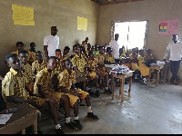 Some members of Human Rights Reporters Ghana in an interaction with students in a classroom