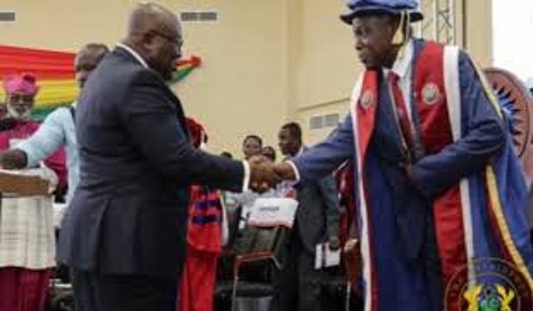 President Akufo Addo shakes hands with new vice chancellor of UEW