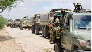 Soldiers line up in a convoy in the Lower Shabelle region of Somalia