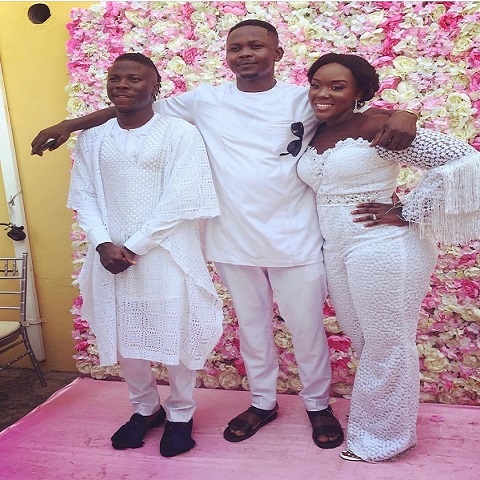 Stonebwoy with his wife and a friend at the naming ceremony