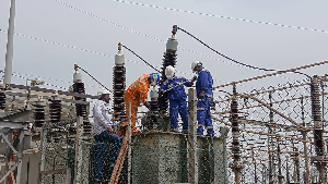 NEDCo engineers working on the faulty transformer